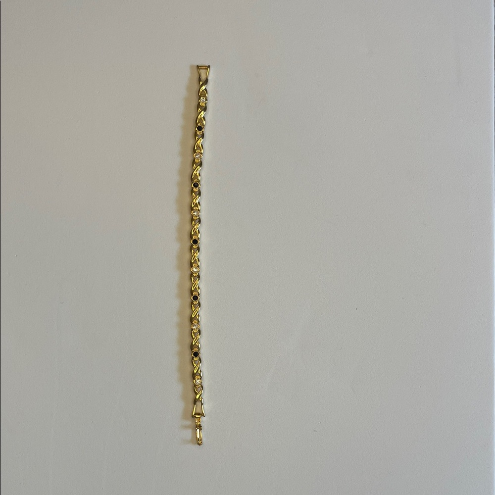 Gold X-link Chain Bracelet clear and black stones.